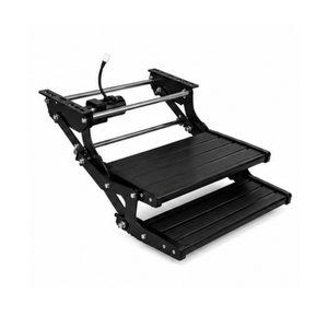Black electric double caravan step extended, showing the two aluminium treads out ready for use