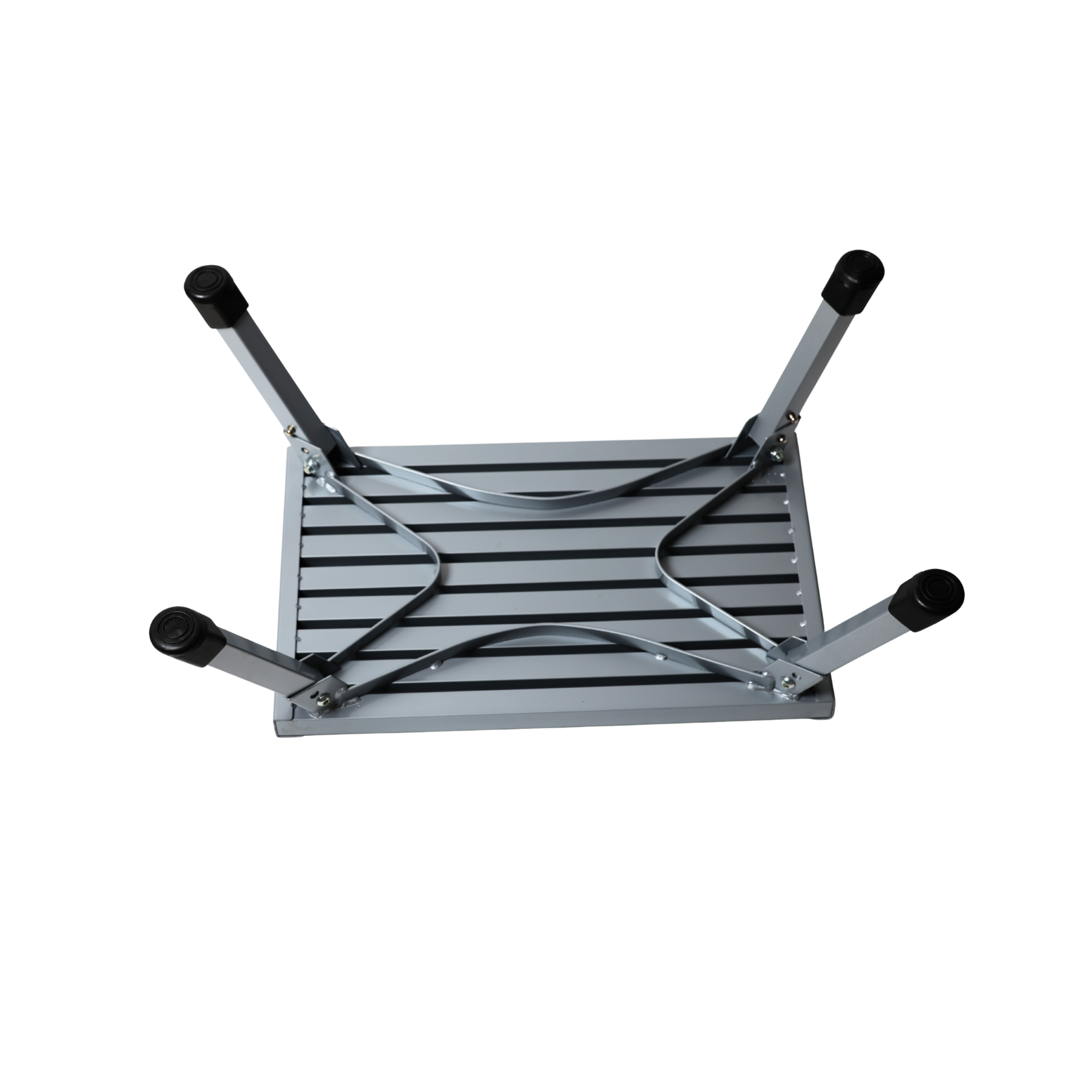 A silver aluminum folding table shown upside down, revealing its slatted metal base and four adjustable legs with black rubber end caps, isolated on a white background.