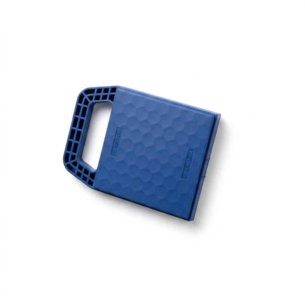 A blue rectangular plastic case with a textured honeycomb pattern on the cover and a molded handle on one end, shown on a plain white background.