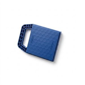 A blue rectangular plastic case with a textured honeycomb pattern on the cover and a molded handle on one end, shown on a plain white background.